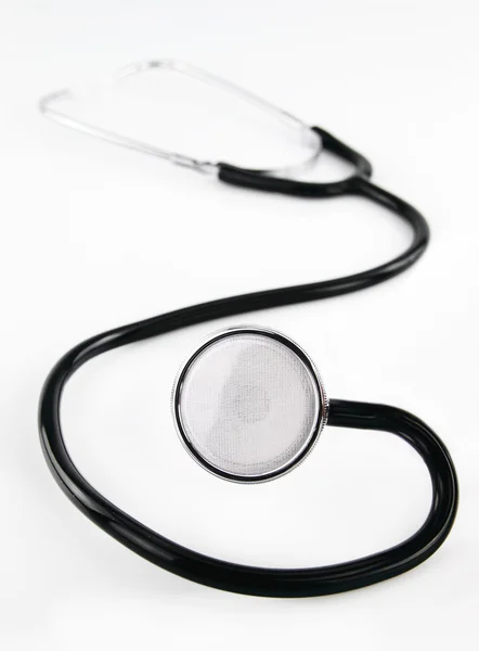 A medical stethoscope on white background — Stock Photo, Image