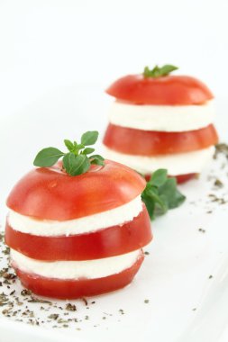 Caprese salad with tomatoes, mozzarella and basil clipart