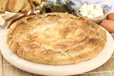 Homemade puff cheese pie with filo pastry clipart