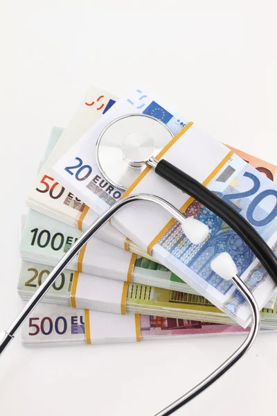 Euro money on and stethoscope — Stock Photo, Image