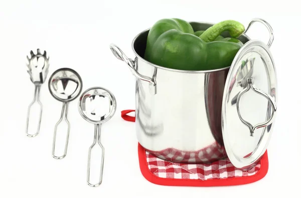 Fresh green pepper inside a pot — Stock Photo, Image