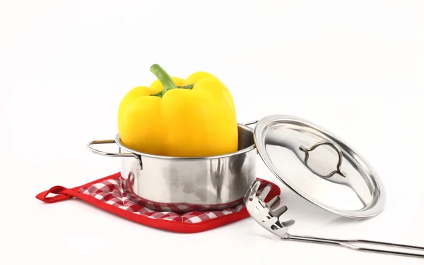 Fresh yellow pepper inside a pot — Stock Photo, Image