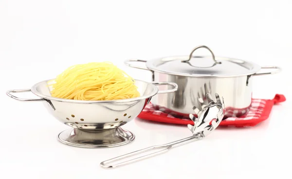 Group of spaghetti inside a strainer — Stock Photo, Image