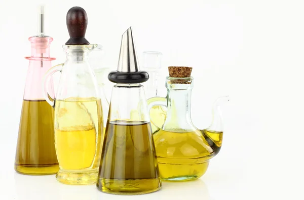 Various bottles of olive oil — Stock Photo, Image