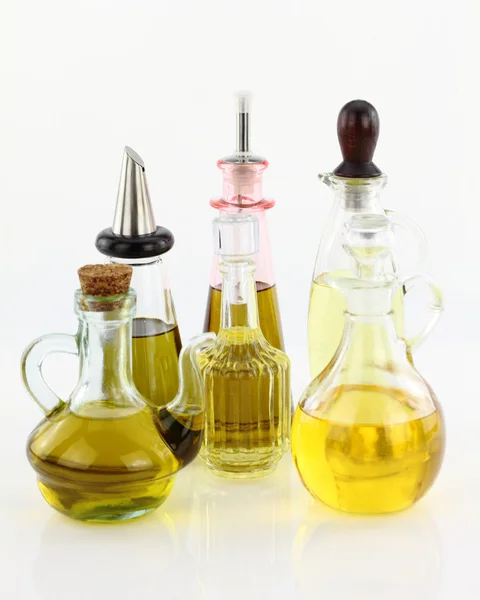 Various bottles of olive oil — Stock Photo, Image