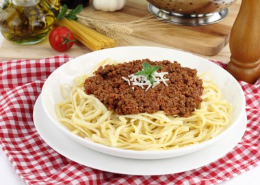 Bolognese pasta with cheese and basil clipart