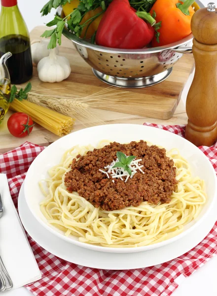 Bolognese pasta with cheese and basil — Stock Photo, Image