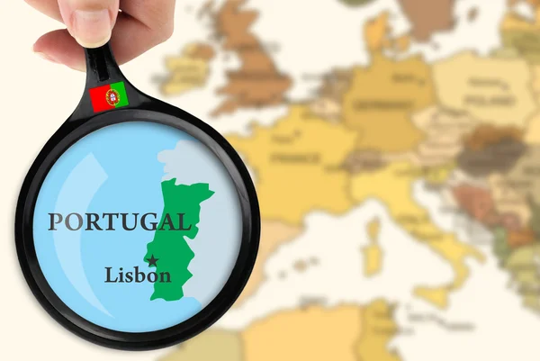 Stock image Magnifying glass over a map of Portugal