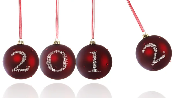 2012 v newton? s kolébkou vánoční koule — Stock fotografie