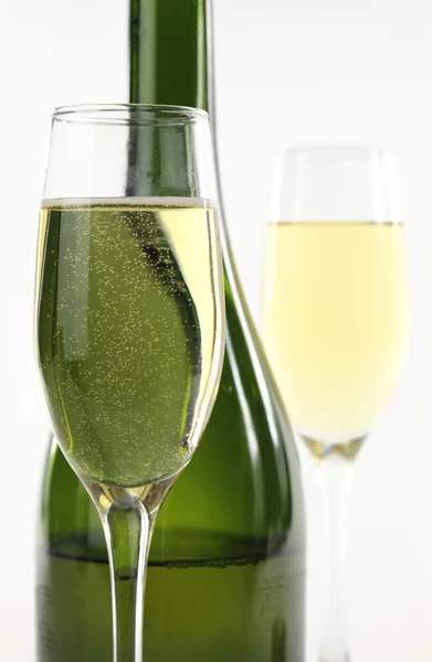 Garrafa e copos de champanhe — Fotografia de Stock