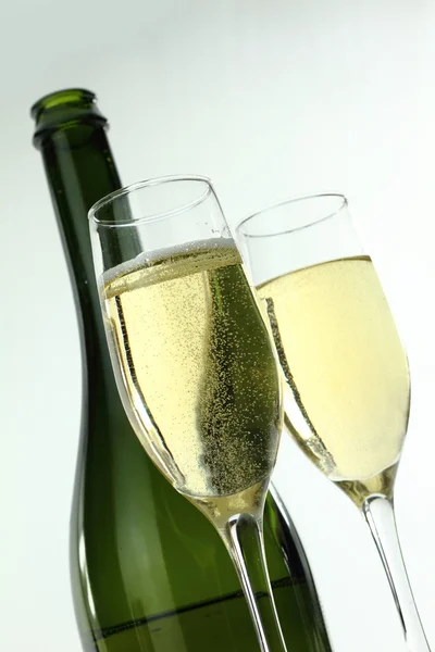 Bottle and glasses of champagne Royalty Free Stock Images