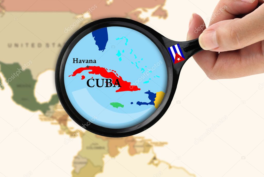 Magnifying glass over a map of Cuba