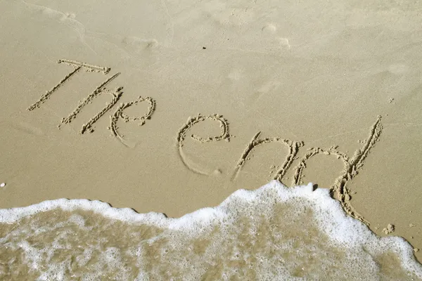 The end writing draw in sand — Stock Photo, Image