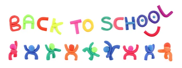 Plasticine figures and letters spelling back to school — Stock Photo, Image