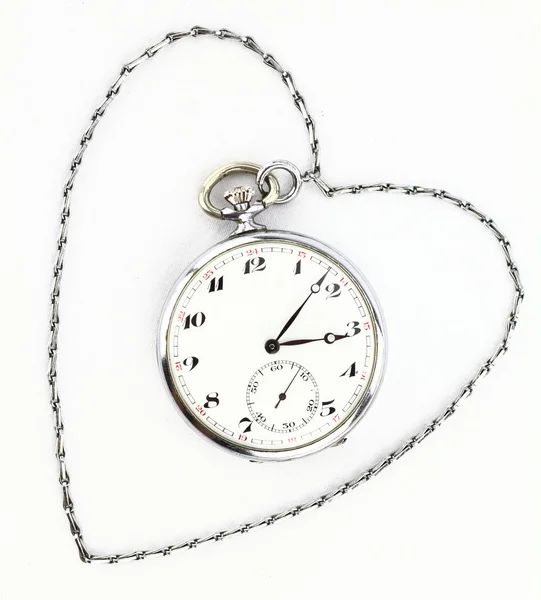 Антикварные карманные часы с цепью — стоковое фото