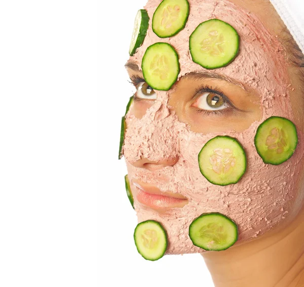 Woman with a facial mask — Stock Photo, Image
