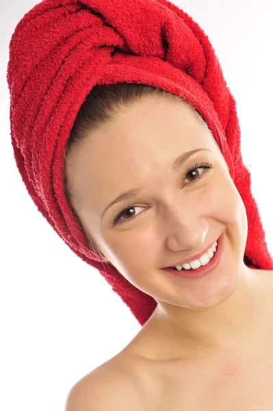 Beautiful young woman in towel — Stock Photo, Image