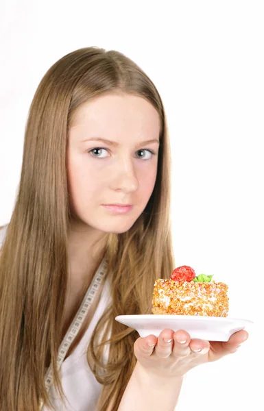 年轻的女孩与一个蛋糕 — 图库照片