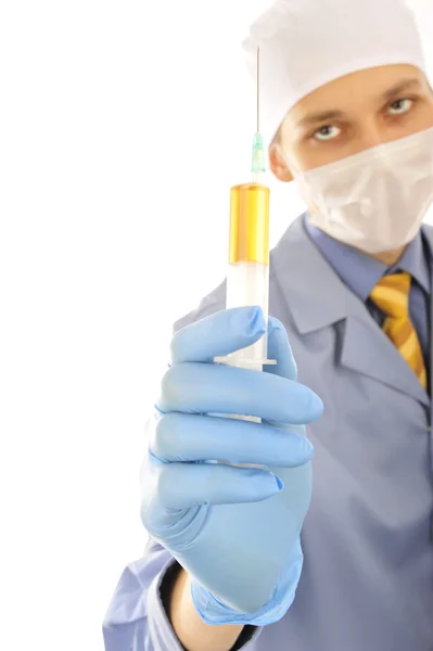 Young doctor with a syringe — Stock Photo, Image