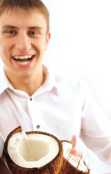 stock image Young man with coconut