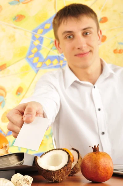 Young man with a blank card — Stock Photo, Image