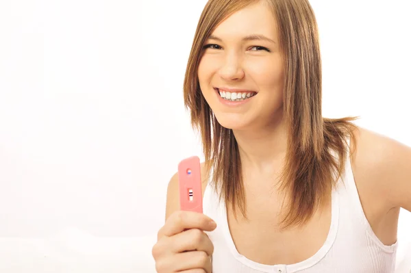 Young girl and pregnancy test — Stock Photo, Image