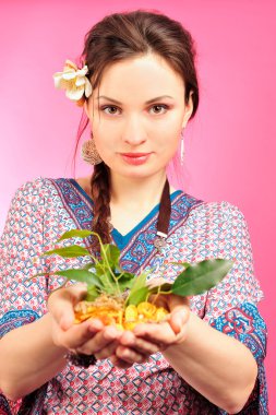 Portrait of a beautiful young girl in Asian clothing. clipart