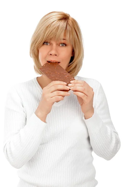 Closeup portrait of a beautiful adult woman holding big chocolat — Stock Photo, Image