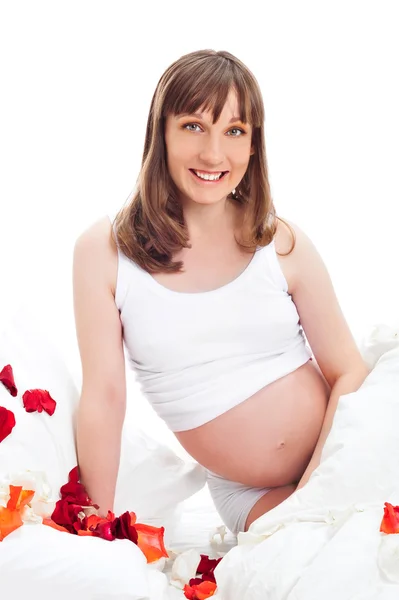 Képek a terhes nőről, amint megérinti a hasát. — Stock Fotó