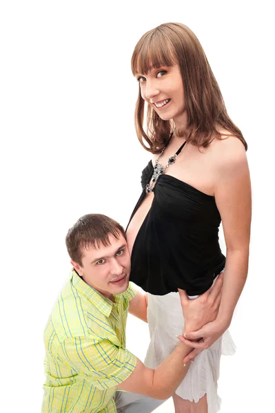妊娠中の女性の手で彼女の腹に触れる — ストック写真