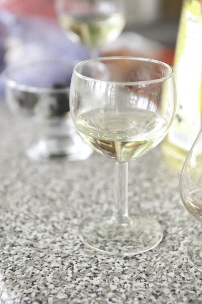 Glass of white wine at a restaurant — Stock Photo, Image