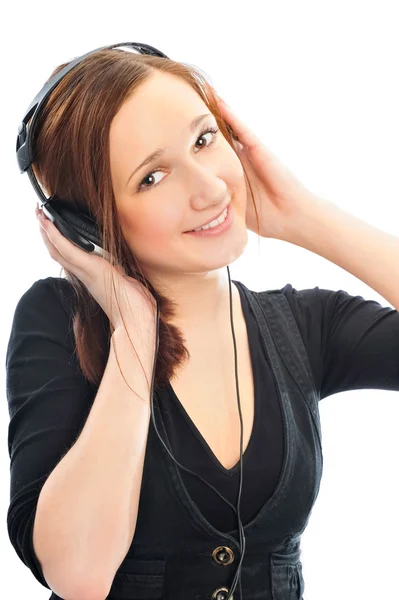 Vacker kvinna med hörlurar, hon är lyssna på musik — Stockfoto