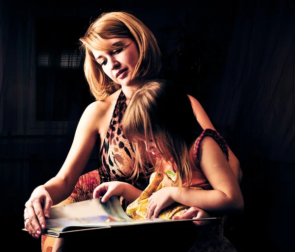 Closeup portrait of adult mother and her little daughter — Stock Photo, Image