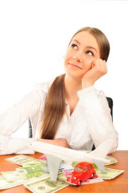 Closeup portrait of young woman deciding between car and aircraf clipart