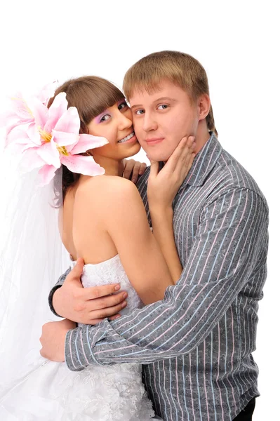Closeup portrait of young caucasian bride and groom against whit — Stock Photo, Image