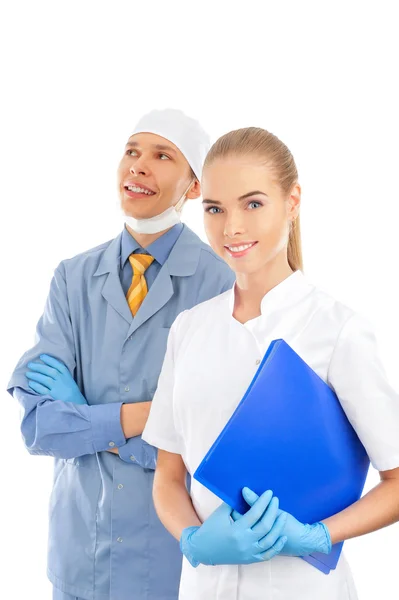 Closeup portrait of two young caucasian doctors standing togethe — Stock Photo, Image