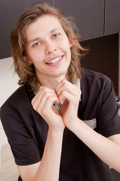 Happy young man falling in love in morinig at home — Stock Photo, Image