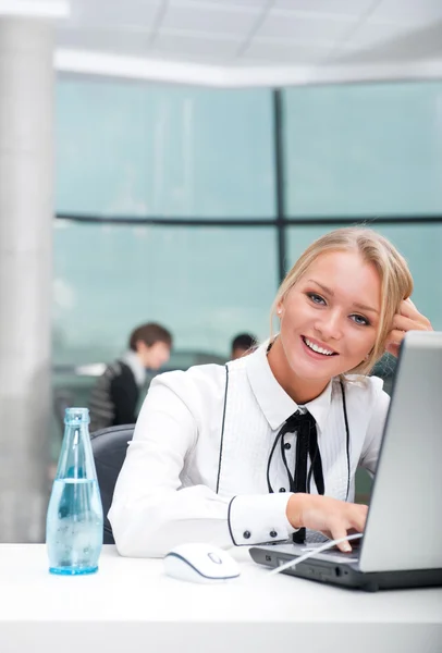 Face of beautiful woman on the background of business — Stock Photo, Image
