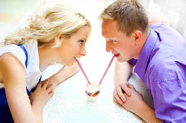 Closeup portrait of young cute couple at mall cafe. — Stock Photo, Image