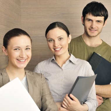 Portrait of three office workers. clipart