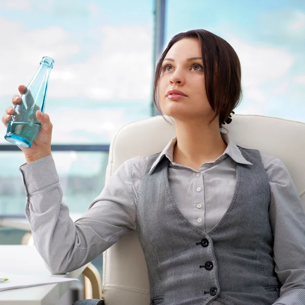 Beautiful business woman thinking about something while drinking — Stock Photo, Image