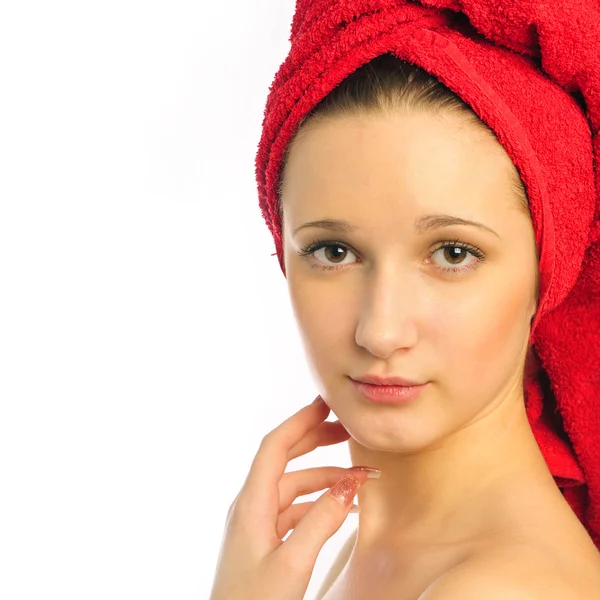 Beautiful young woman after shower with towel on her head — Stock Photo, Image