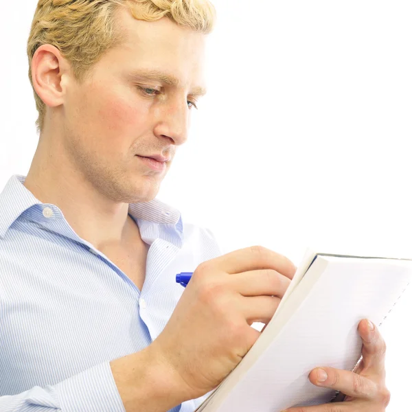Closeup portrait of a cheerful young business man signing docume — Stock Photo, Image