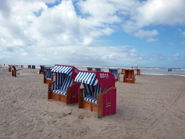 Cadeiras de praia na ilha de amrum na alemanha — Fotografia de Stock