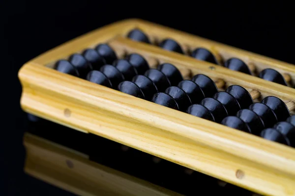 Abacus com fundo preto — Fotografia de Stock