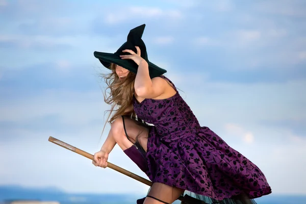 stock image Pretty witch with hat and broom