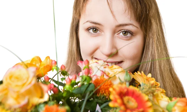 Young blond woman with flowers — Stock Photo, Image