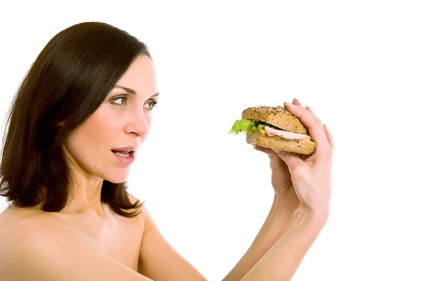 Burger yiyen kadın — Stok fotoğraf