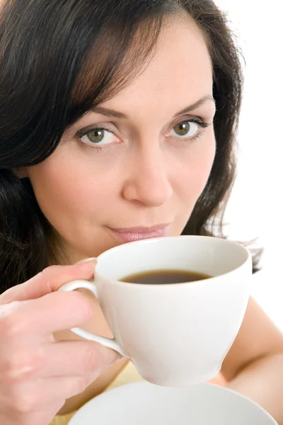 Woman enjoying a cup of tea Stock Image