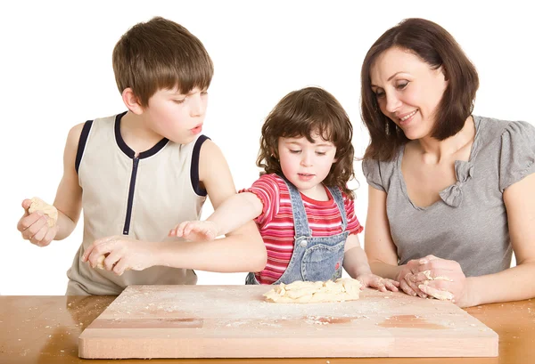 stock image Mother and children making a dough